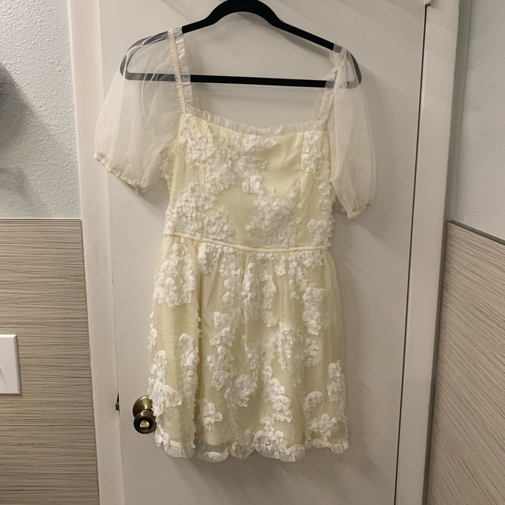Storia Cream Dress with Ruffled Details